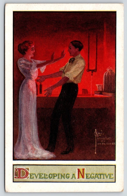 C Ryan~Developing a Negative~Man & Woman In Dark Room~Photography~c1910 Postcard