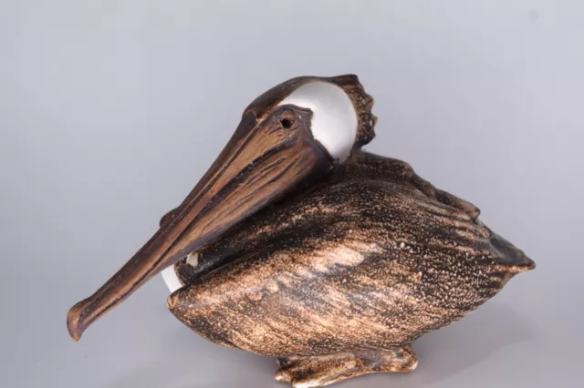 Brown pelican sitting figurine, nautical theme