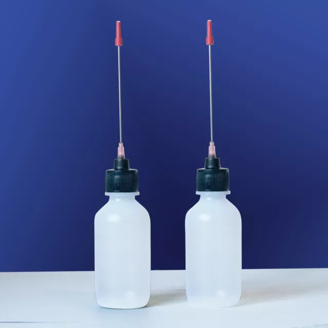 Two 2 OZ bottles with needle tip dispenser, pharmaceutical grade