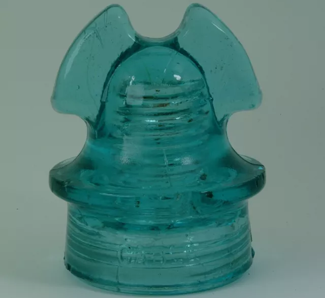 Oakman Manufacturing Company - Glass Insulator - CD259 - Roman Helmet - Aqua