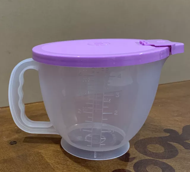 https://www.picclickimg.com/z9AAAOSwfD9fHhoq/Tupperware-Mix-N-Store-Classic-Measuring-Mixing-Pitcher.webp