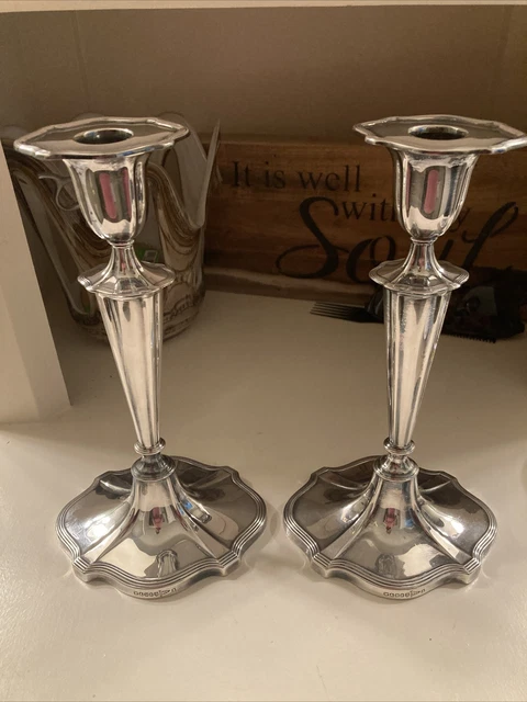 A Pair Of Antique Walker & Hall Silver Plated Candlesticks