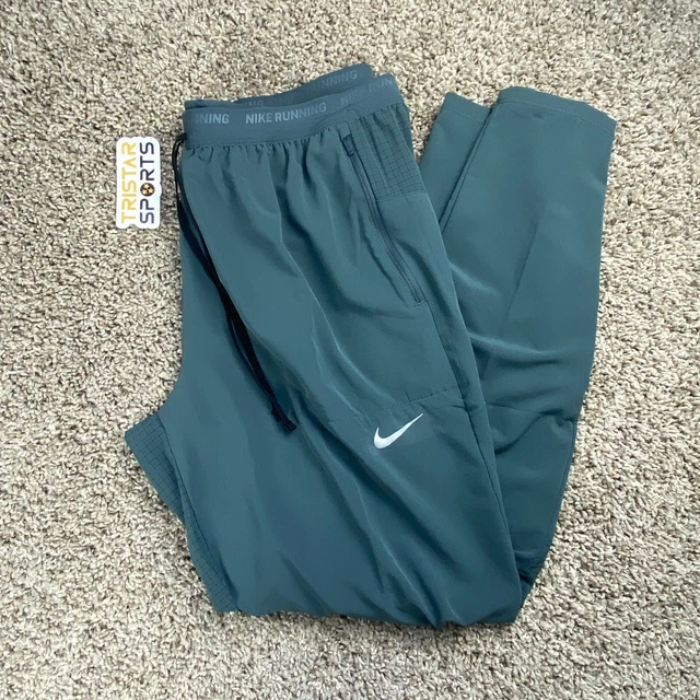 Green nike deals jogging pants
