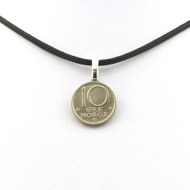 Collana realizzata con perle grigie alternate da perle filigranate