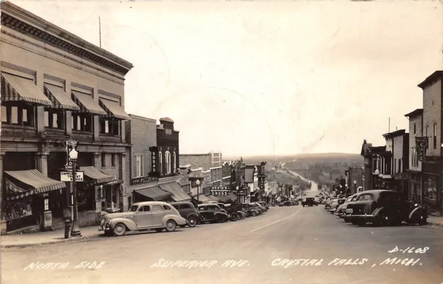 J10/ Crystal Falls Michigan RPPC Postcard c1942 Superior Ave Stores 71