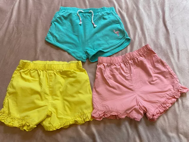 Pacchetto pantaloncini da bambina età 7 anni rosa giallo verde