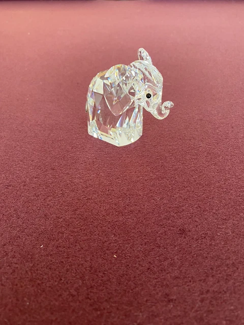 swarovski crystal figurines Baby Elephant with metal tail, no box, approx 1.5” h
