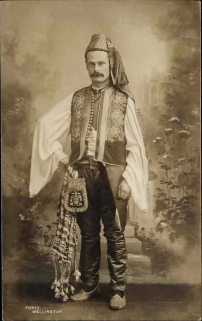 Man in Studio Ethnic Eastern European Costume Wellington England - RPPC c1910