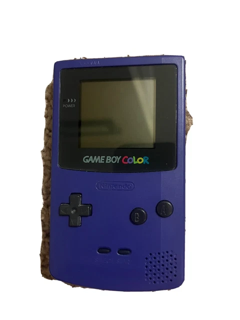 Nintendo Game Boy Color Handheld System - Purple With Game Assortment Lot Nintendo Game Boy Color Handheld System - Purple With Game Assortment Lot