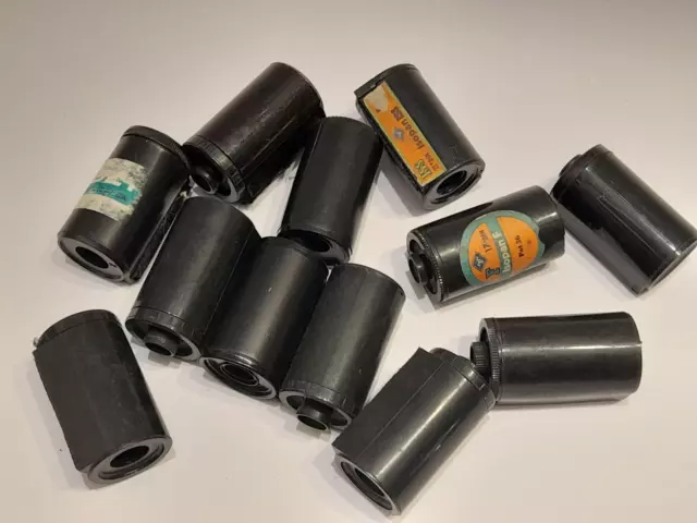 Twelve plastic Reloadable Magazine 35mm Film load taking Spool Canisters