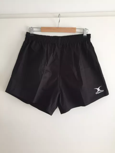 short rugby Gilbert noir taille L neuf