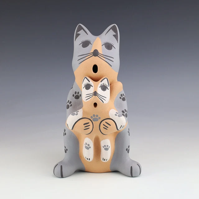 Christmas Dog Storyteller by Darrick Tsosie, Jemez Pueblo www