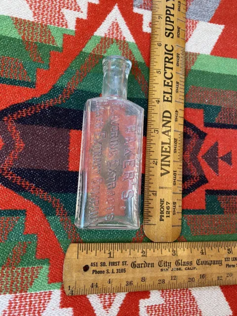Antique Patina Embossed Baker's Flavoring Extracts Clear Glass Bottle 5” Vintage