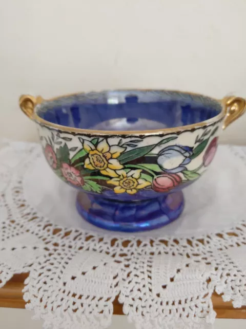 Blue Lustre Bowl Spring Flowers.  By Maling. Two handles. Gilding