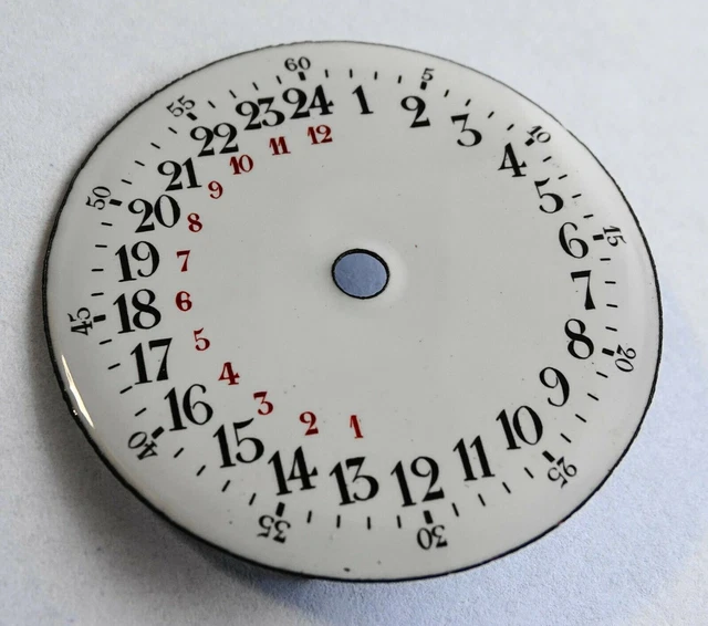 Montre gousset double boitier or, le cadran émaillé blanc à chiffres romains et arabes et