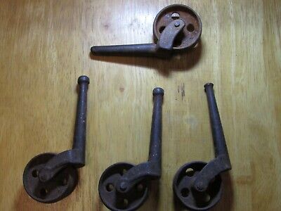Cast Iron ROLLERS Architectural SALVAGE, Set of 4 - 3 are matching, one is not !