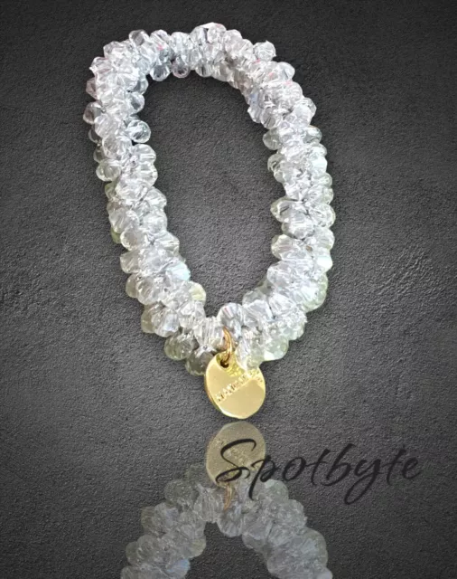 Bracciale Braccialetto elastico Donna bianco/argento con ciondolo color oro
