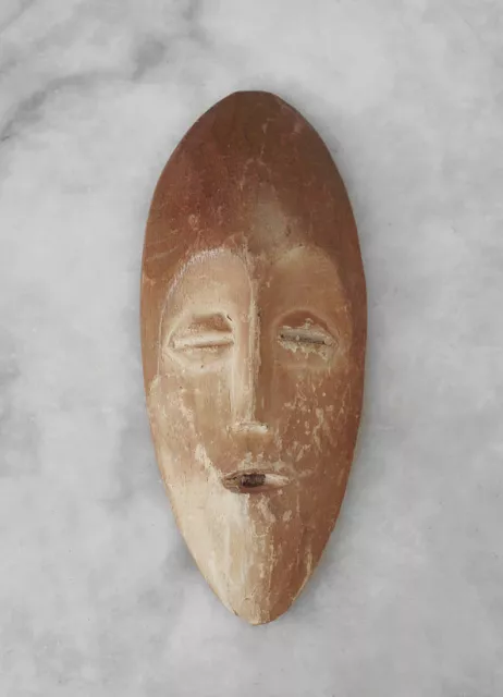 Antique Lega passport mask, Congo