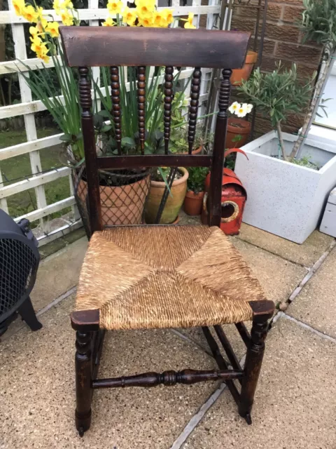 19th Century Antique Country Elm/Oak Rush Seat Bobbin Back Small Rocking Chair