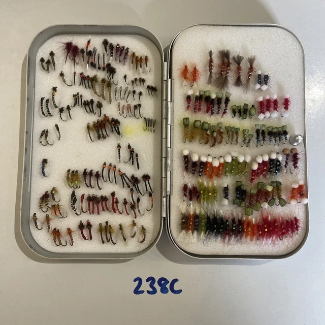 Lovely salmon flies in a nice Richard Wheatley swing leaf