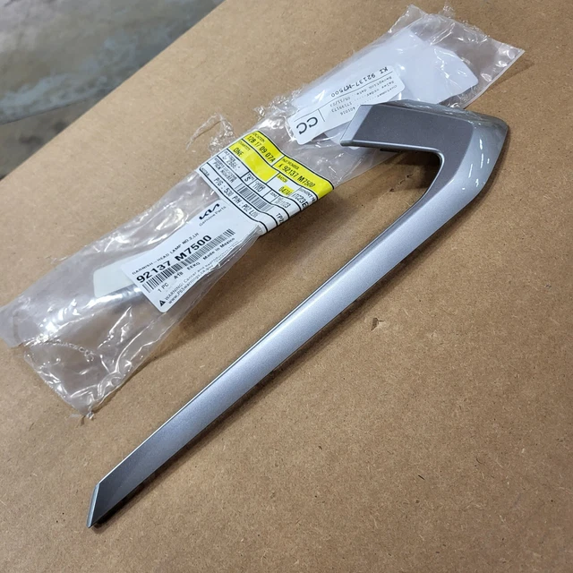 2022-2023 Kia Forte left headlight silver cover trim panel strip molding OEM