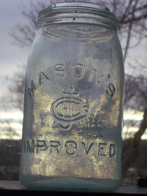 ground lip 1 qt. Mason's CFJCo. Improved reverse Clyde, N.Y. logo canning jar.