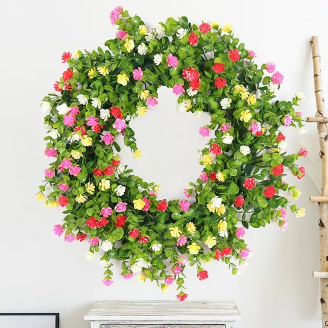 Belle petite couronne de fleurs sauvages parfaite pour la décoration de porte d