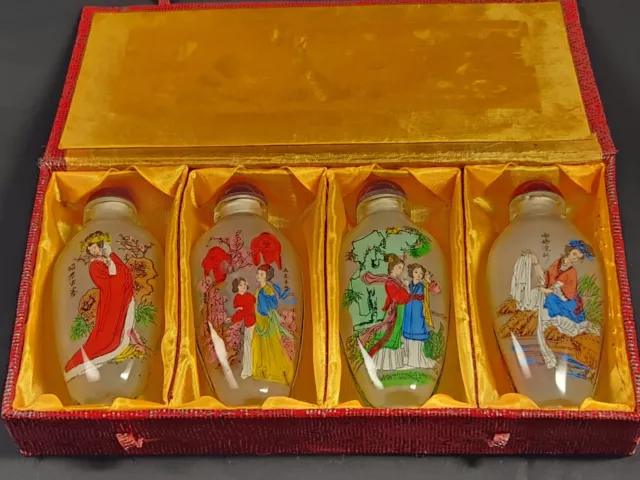 Boxed set of 4 Asian reverse painted snuff bottles Geisha