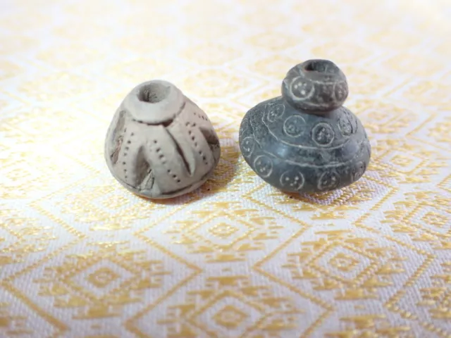 Pre-Columbian ceramic spindle whorls from Ecuador with engraved art work