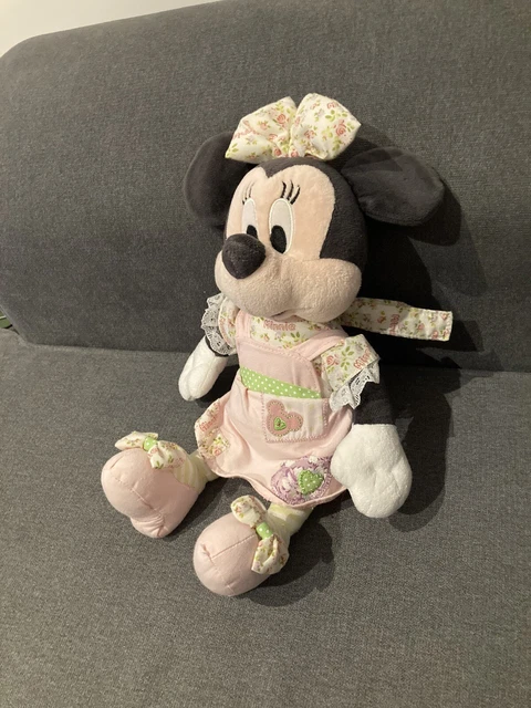 doudou peluche Minnie musicale robe rose  noeuds à fleurs DISNEY NICOTOY