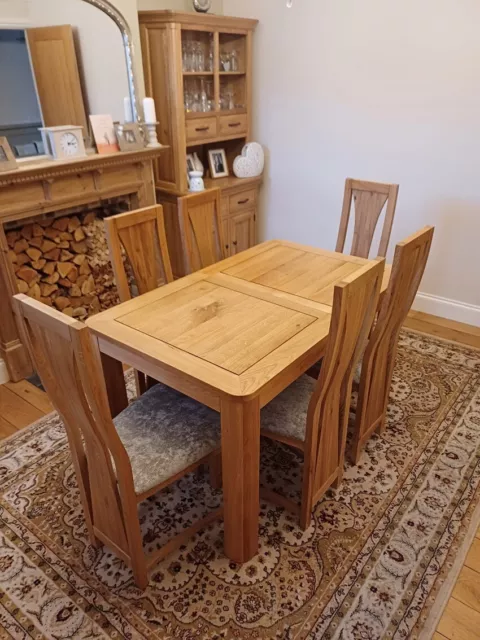 Oak furniture land marble dining table discount