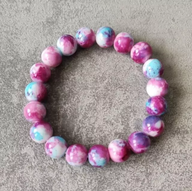 Bracciale elasticizzato con perle in vetro con effetto multicolore