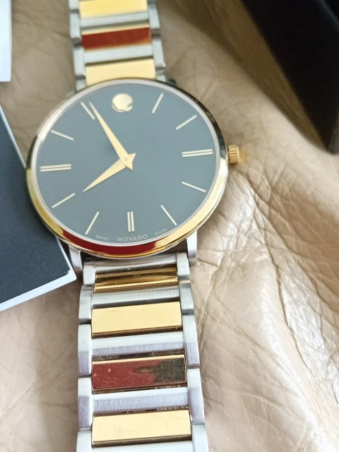 Movado Ultra Slim gold and silver Stainless Steel Men's Watch, boxed.