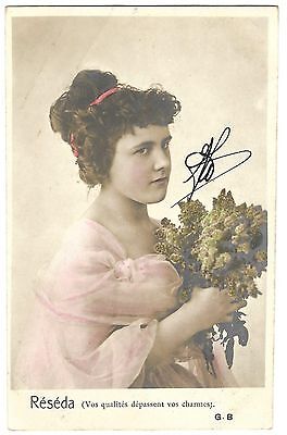 Beautiful Woman with lilac flowers vintage Real Photo Postcard - 1902