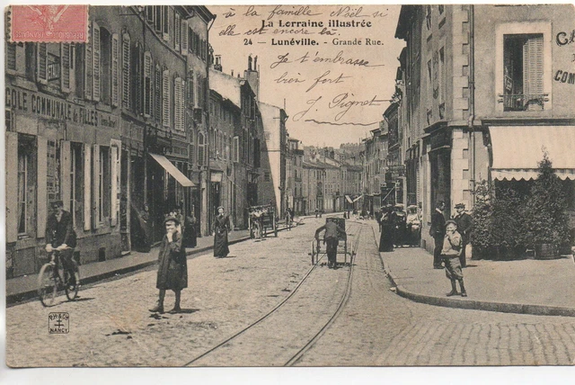 LUNEVILLE - Meurthe et Moselle - CPA 54 - des magasins dans la grande rue