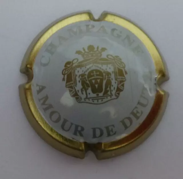 Capsule de champagne Deutz n° 31  Or et blanc, 32 mm  Cote 25€