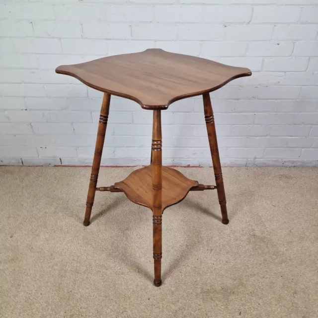 An Antique Victorian Aesthetic Movement Walnut Occasional Table