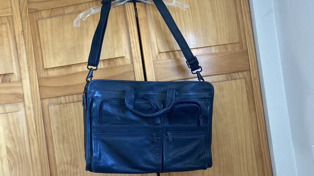 Tumi black leather messenger/laptop/briefcase/bag