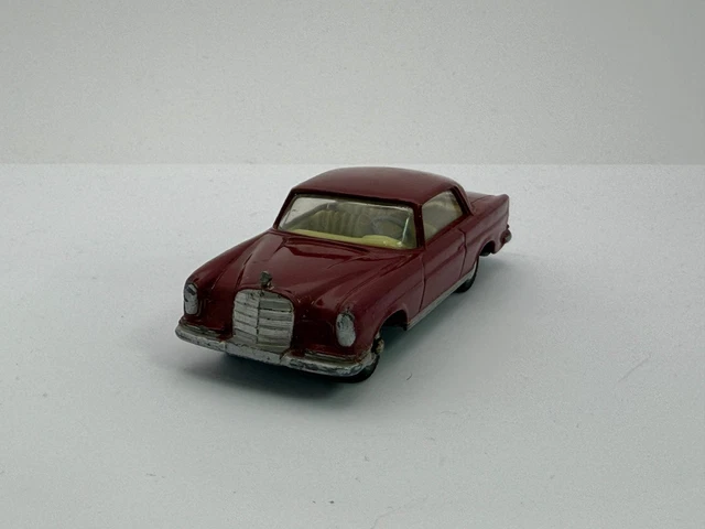 A Boxed Corgi E Type Jaguar (Re-Painted) a Mercedes-Benz 220 SE Coupe