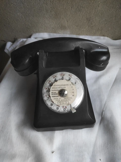 What is this old telephone with a PTT button