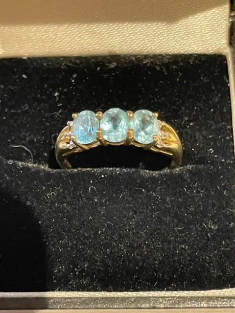 9ct gold blue topaz   and diamond  ring  size n and a half