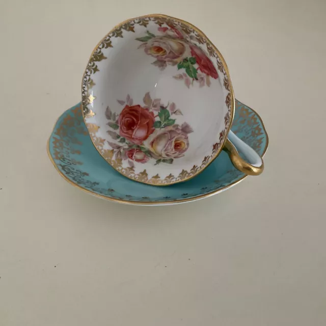 Royal Albert blue cup and saucer roses and gilt pattern