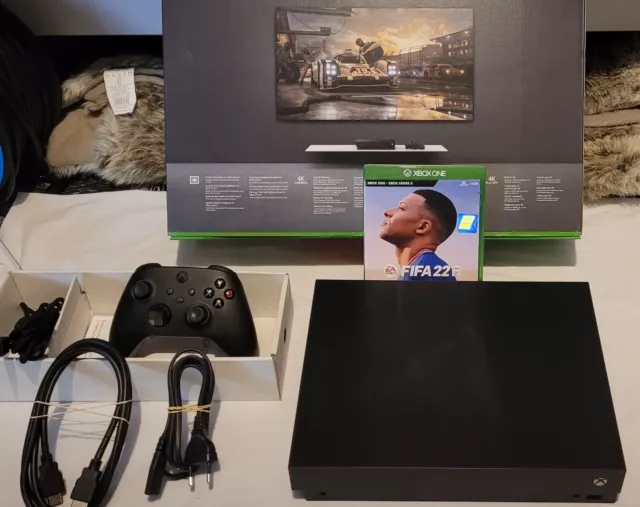 Console Xbox One X 1TO + metavolt dual chargeur neuf