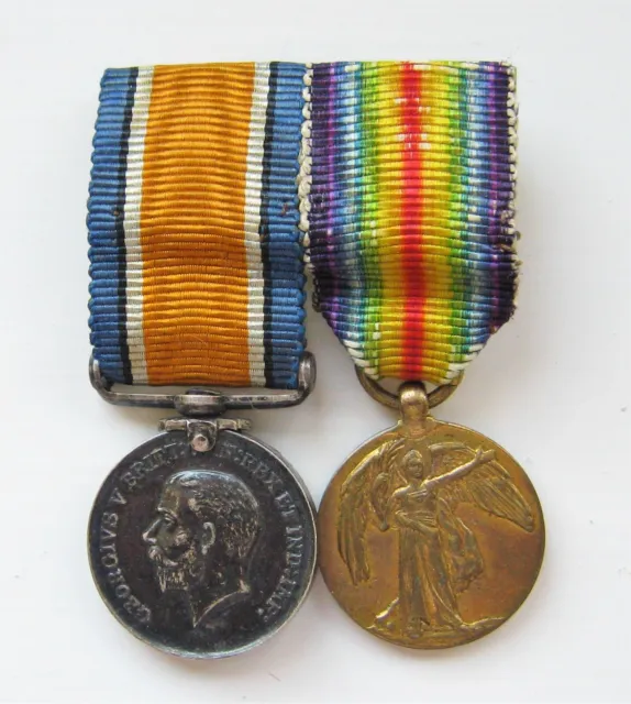 A Contemporary Ww1 Pair Of Miniature British War And Victory Medals