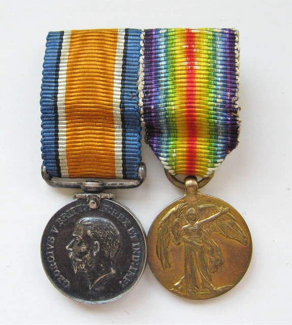 A Contemporary Ww1 Pair Of Miniature British War And Victory Medals