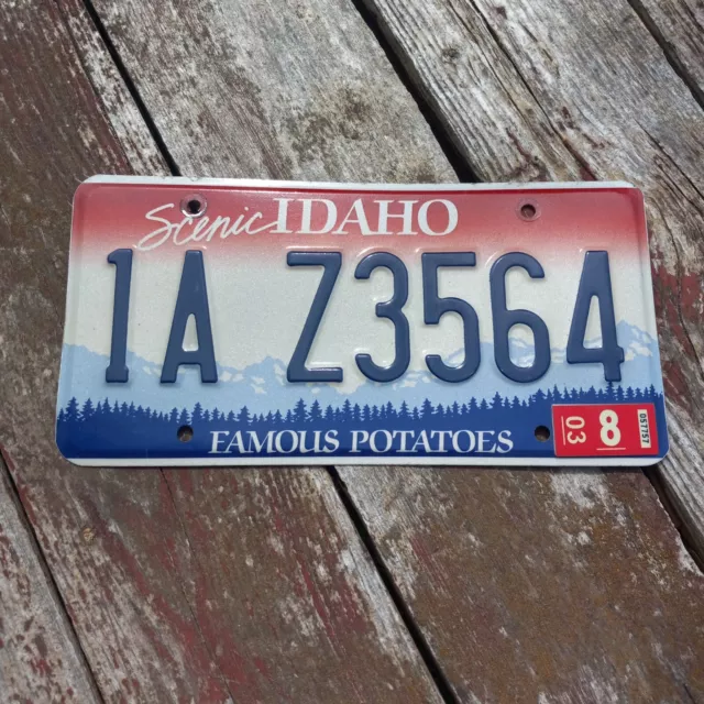 2003 Idaho License Plate - "1A Z3564" 8 03 Sticker SCENIC IDAHO POTATOES
