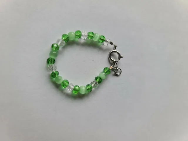 Newborn baby bracelet:4mm glass pearl beads with green and white. Green cats eye