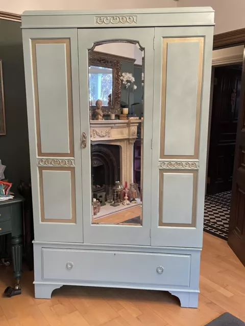 Antique wardrobe with mirror door