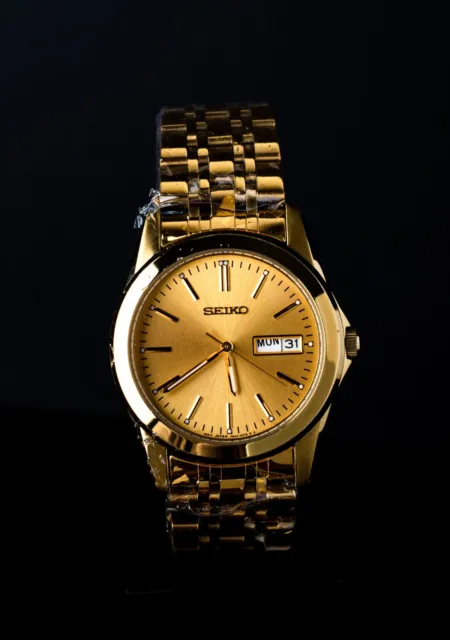 SEIKO HERREN SAPHIR Vintage schmal Datum Quarz vergoldete Armbanduhr  7N320AZO EUR 109,61 - PicClick DE