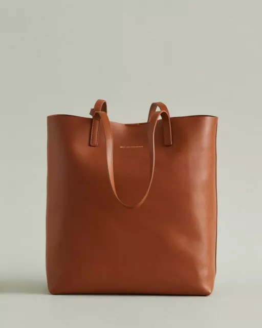 WANT LES ESSENTIELS Logan Leather Vertical Tote in Amber 595